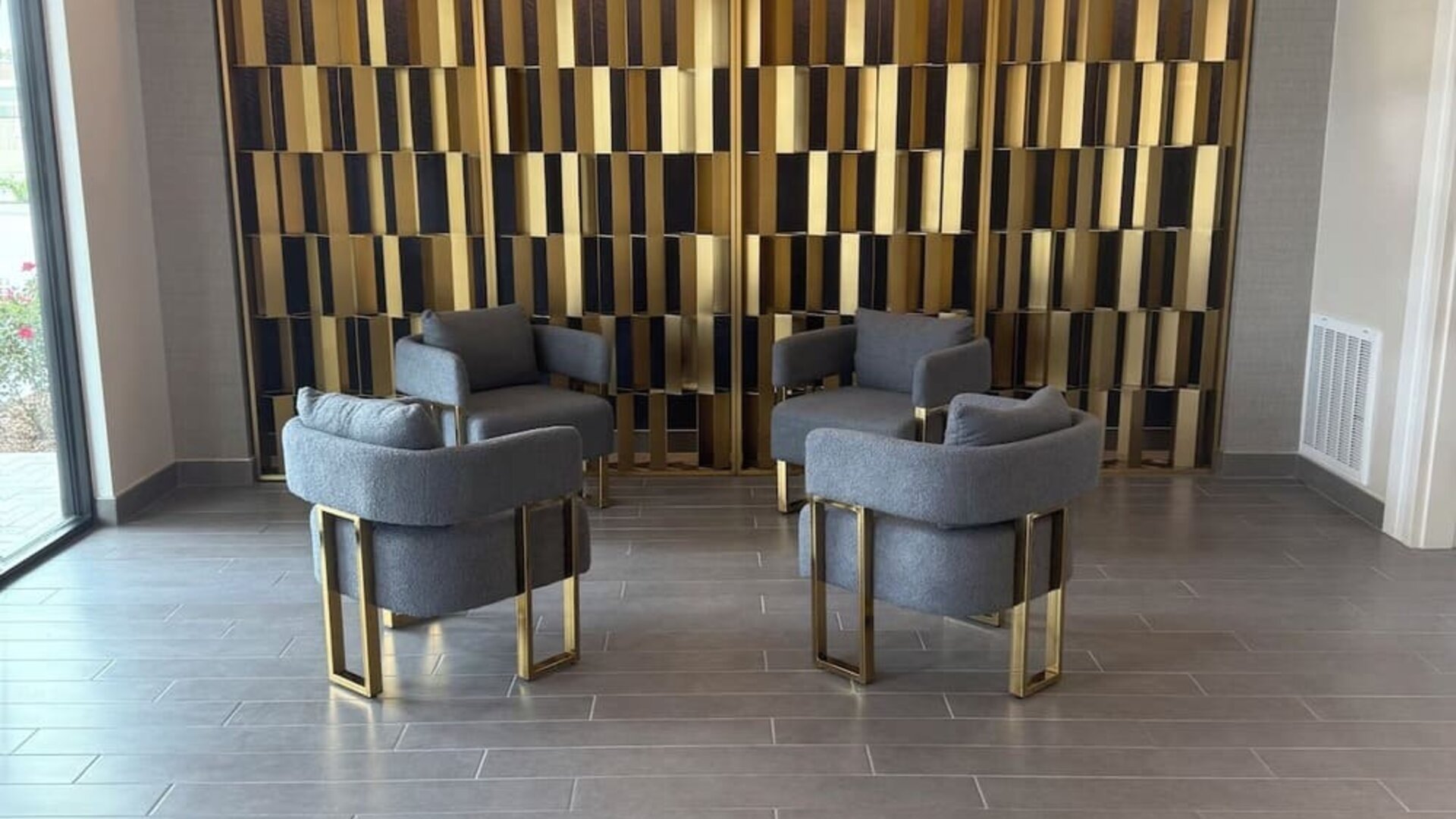 Lobby seating at Palace Inn Blue 290 W 43rd & Bingle Rd.