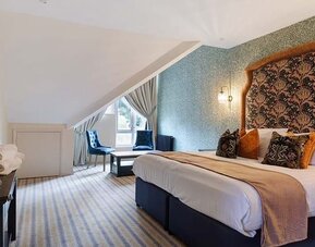 Day room at Thatcher's Hotel - Surya Hotels.