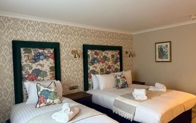 Day room at Thatcher's Hotel - Surya Hotels.