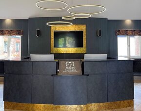 Reception at Thatcher's Hotel - Surya Hotels.