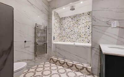 Bathroom at Thatcher's Hotel - Surya Hotels.