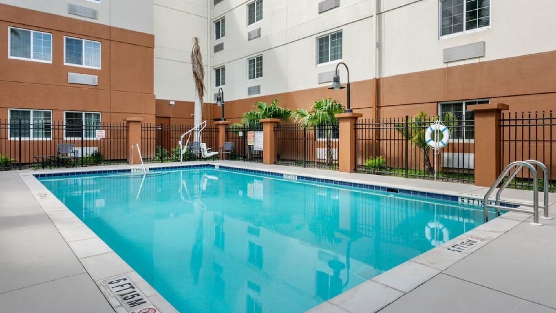 Outdoor pool at Candlewood Suites Fort Myers/Sanibel Island.
