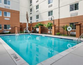 Outdoor pool at Candlewood Suites Fort Myers/Sanibel Island.