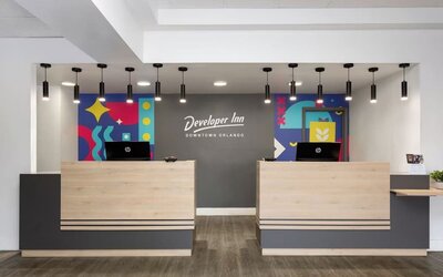 Reception desk at Developer Inn Downtown Orlando.