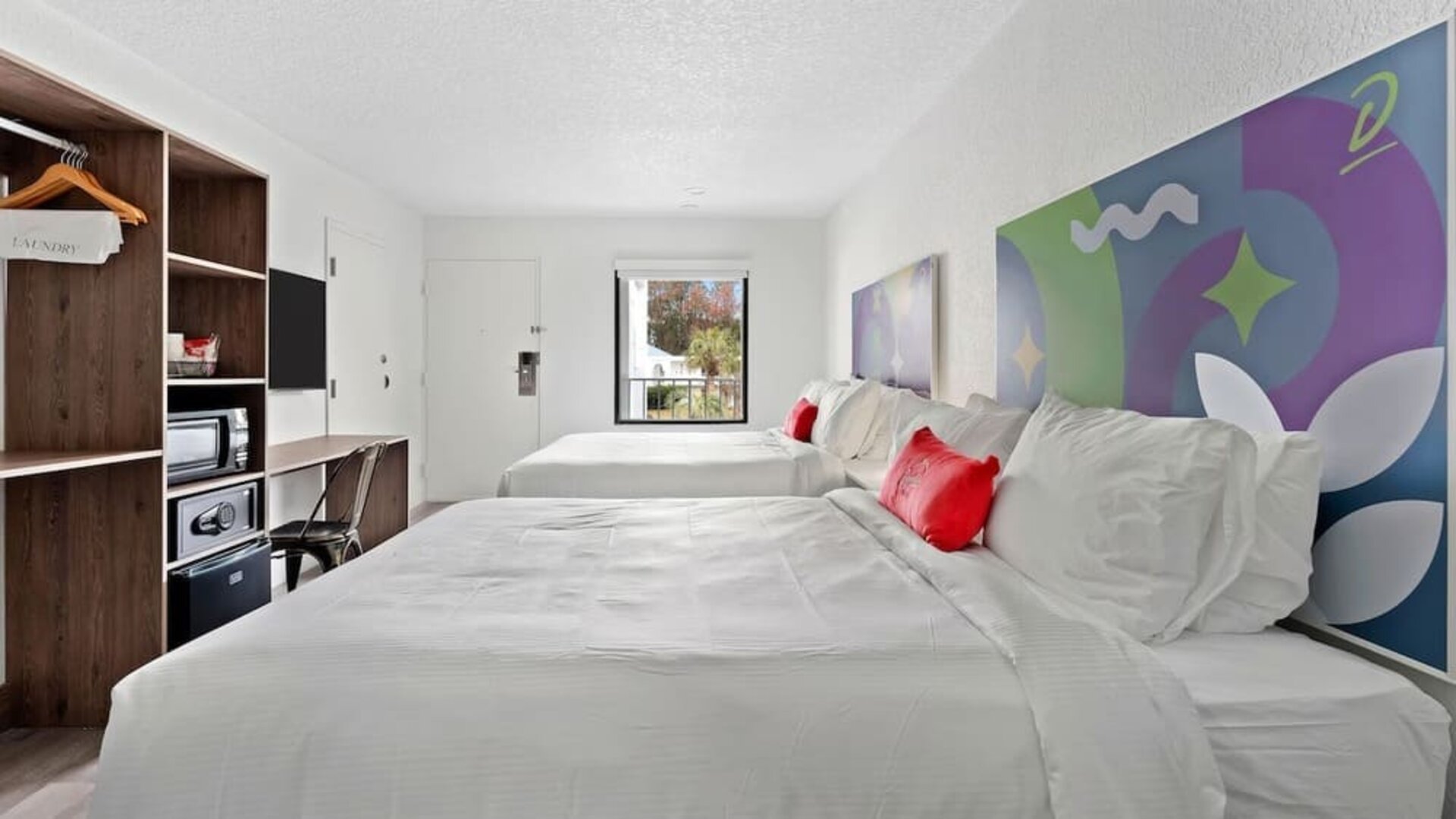 Day room with workspace and natural light at Baymont By Wyndham Jacksonville Airport.