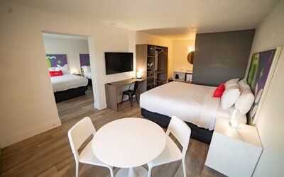 Day room with workspace at Baymont By Wyndham Jacksonville Airport.