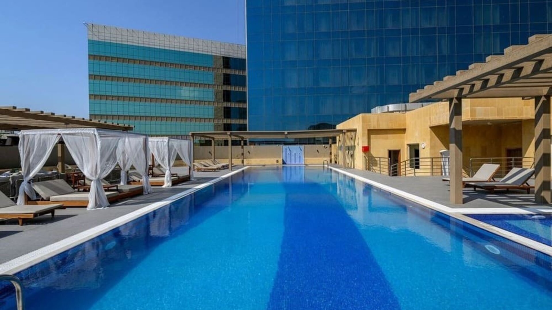 Outdoor pool at DoubleTree By Hilton Jeddah Al Andalus Mall.
