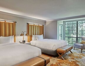 Two beds at The Inn At Saratoga, Tapestry Collection By Hilton.
