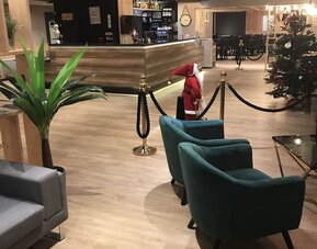 Lobby area at EUROHOTEL Airport Orly Rungis.