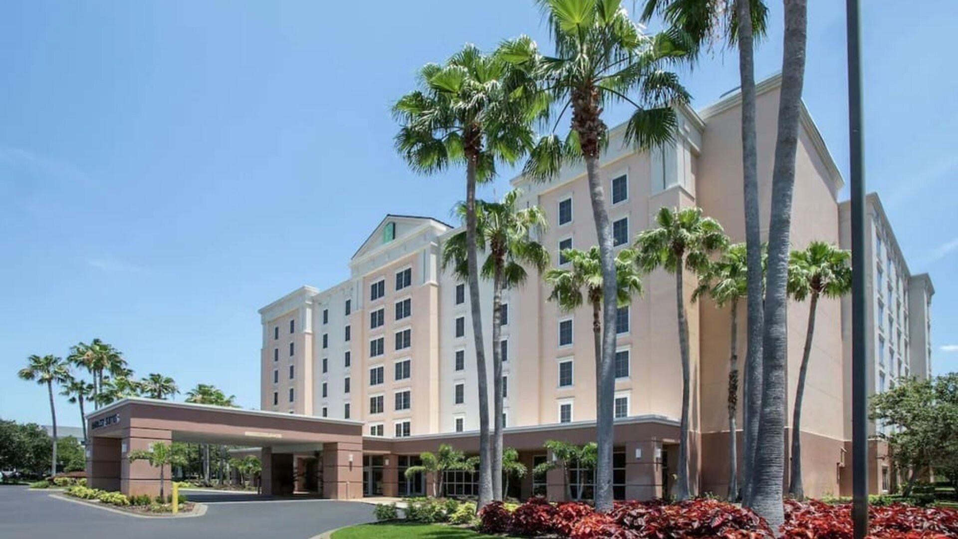Property exterior at Embassy Suites By Hilton Orlando Airport.