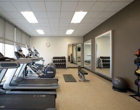 Gym at Embassy Suites By Hilton Orlando Airport.