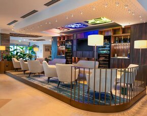 Lobby and lounge at Hilton Garden Inn Brussels Airport.