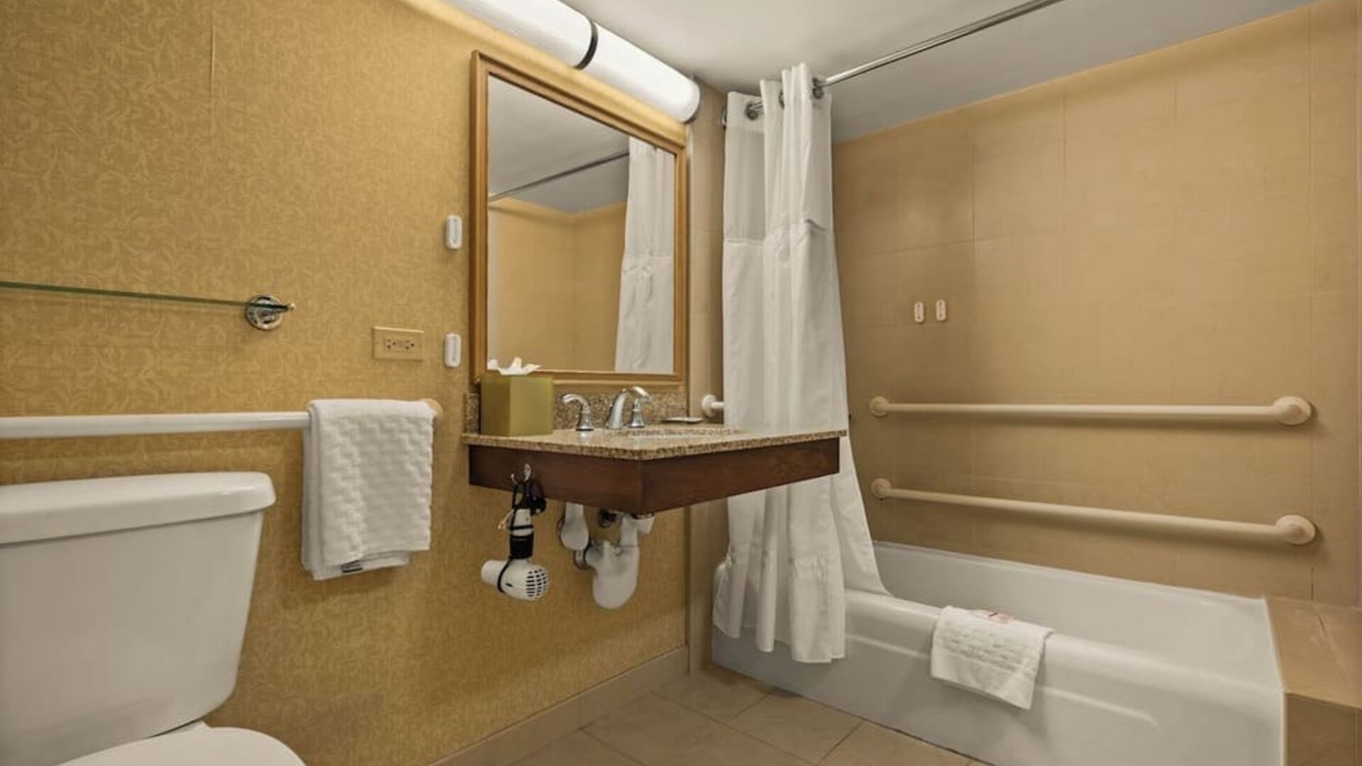 Bathroom at Airport Honolulu Hotel, Trademark Collection By Wyndham.