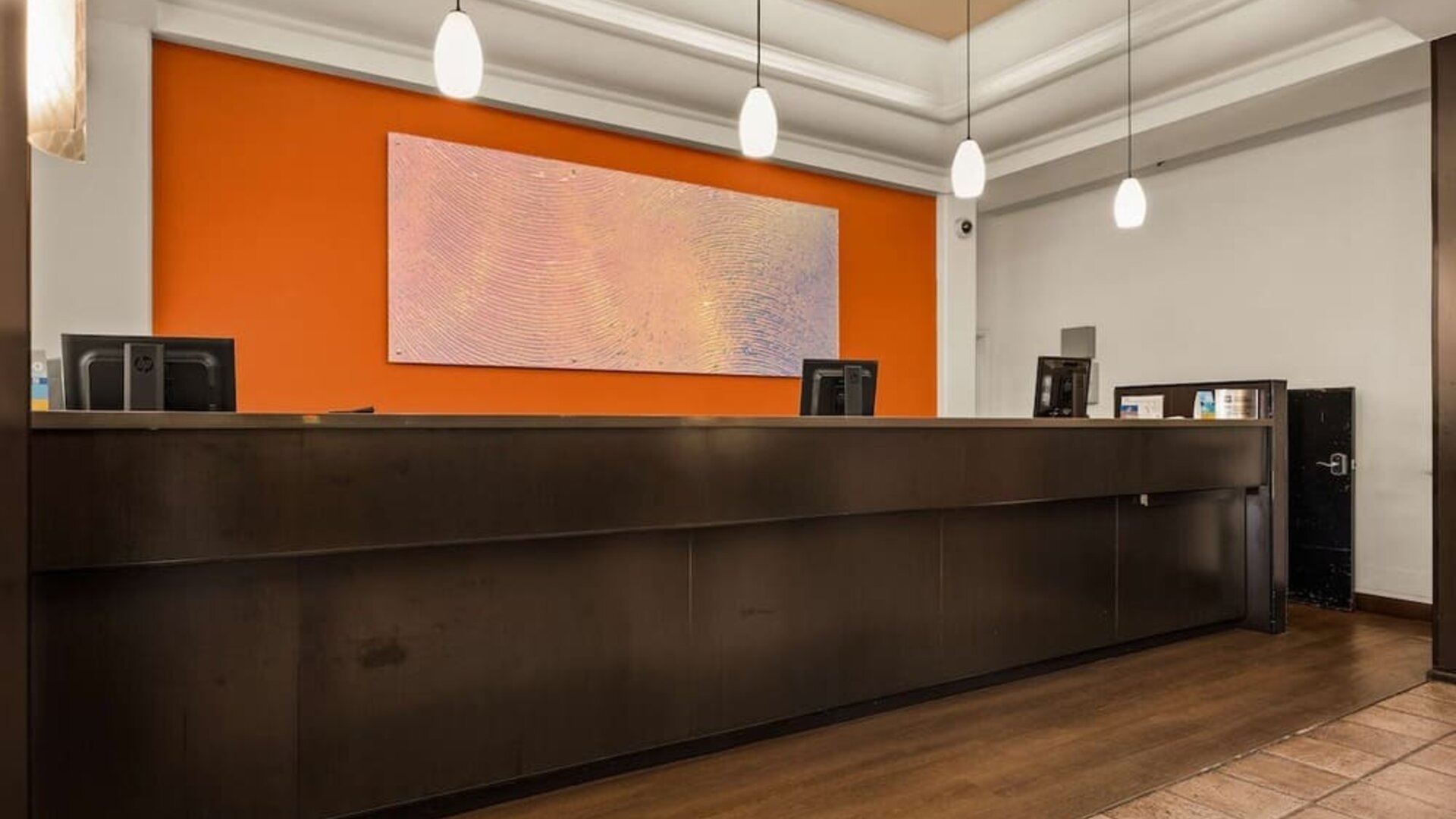 Reception desk at Best Western The Plaza Hotel Honolulu Airport.