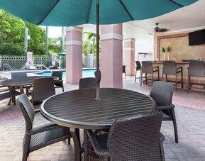 Outdoor dining at DoubleTree By Hilton Sunrise.