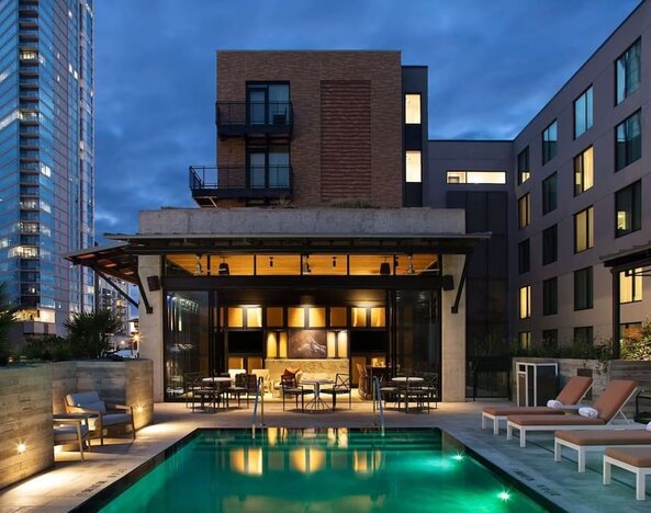 Pool and cabanas at Canopy By Hilton Austin Downtown.