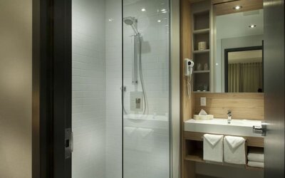 Bathroom at Ramada Laval By Wyndham.