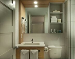 Bathroom at Ramada Laval By Wyndham.