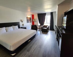 Day room at Ramada Laval By Wyndham.