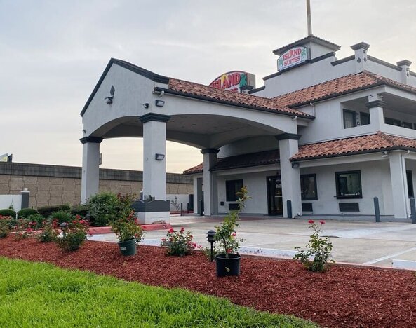 Exterior at Island Suites Hobby Airport.