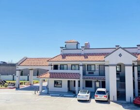 Exterior at Island Suites Hobby Airport.