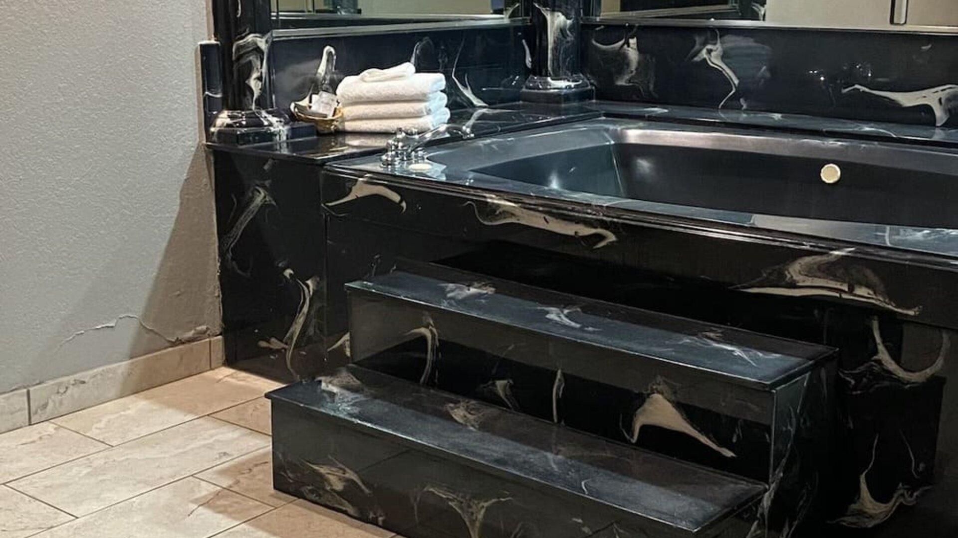 Bathroom at Island Suites Hobby Airport.