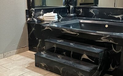 Bathroom at Island Suites Hobby Airport.