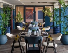 Dining area at ROK Hotel Kingston, Tapestry Collection By Hilton.