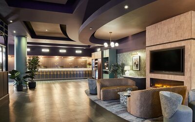 Reception with lobby seating at Leonardo Hotel Dublin Parnell Street.