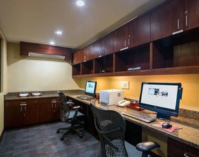 Fully equipped business center at Hilton Garden Inn Tribeca available for guest use.