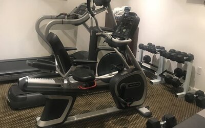 The Madison LES Hotel’s fitness center, with various exercise machinery/equipment.
