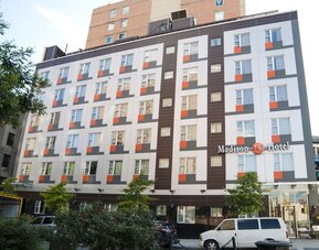 Exterior of Madison LES Hotel in the vibrant Lower East Side of New York City.