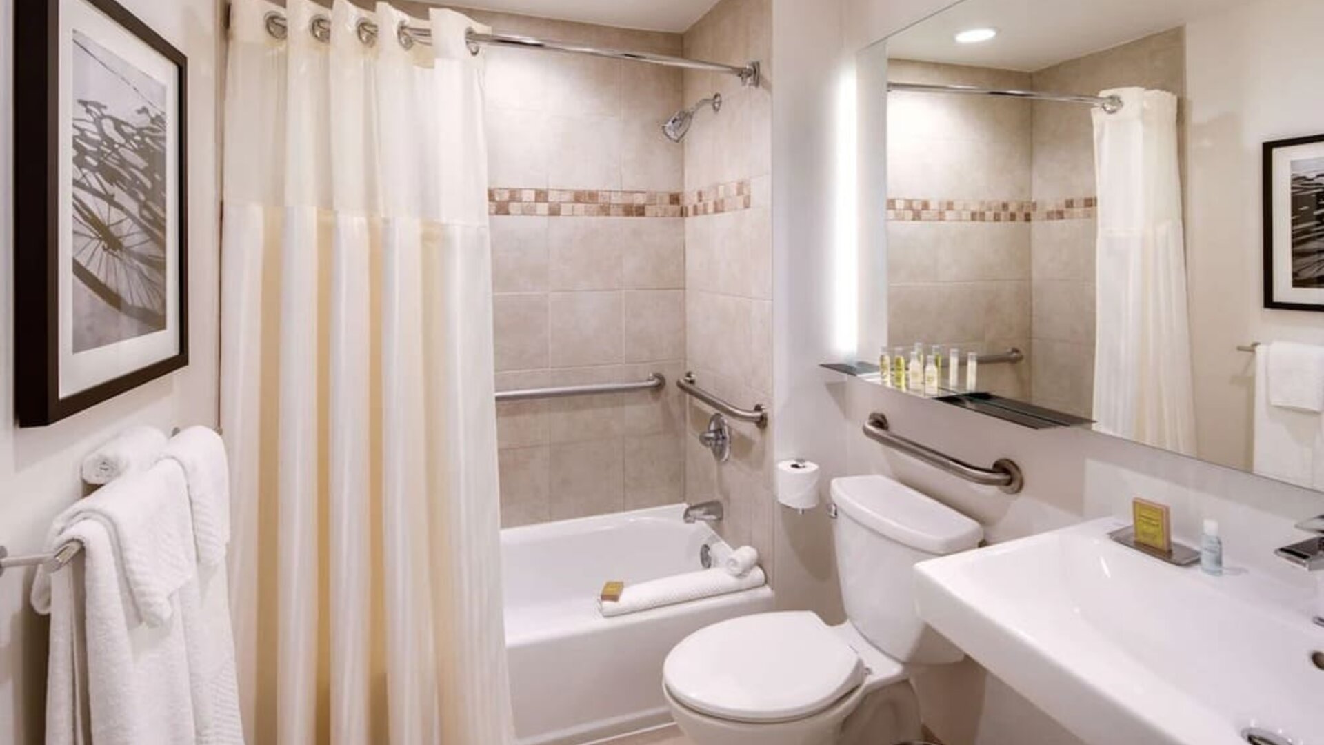 Fully equipped bathroom with plus towels at DoubleTree By Hilton Jersey City.