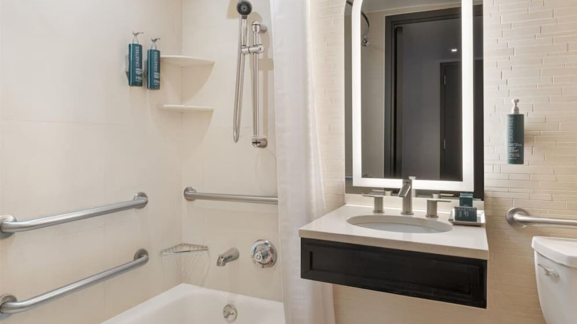 Modern, fully equipped bathroom at Hilton Fashion District.