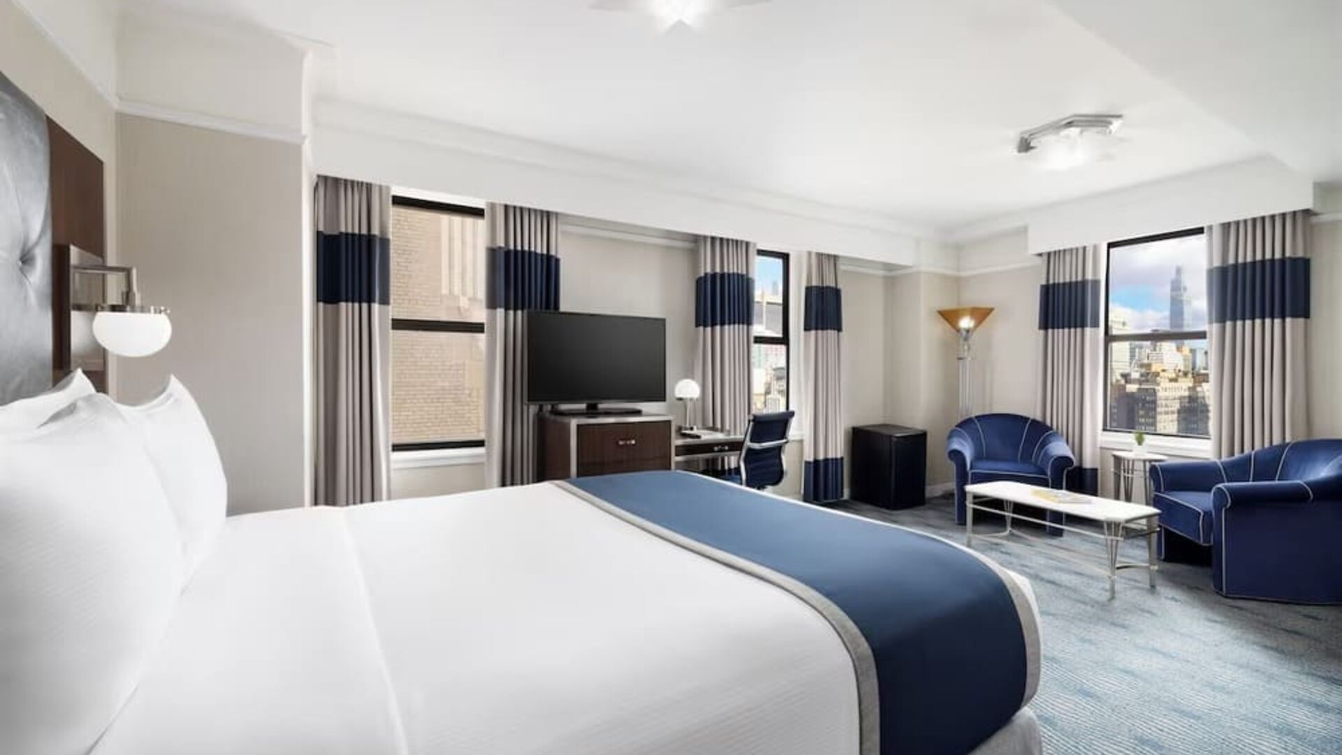 Day use room with work desk and natural light at New Yorker by Lotte Hotels.