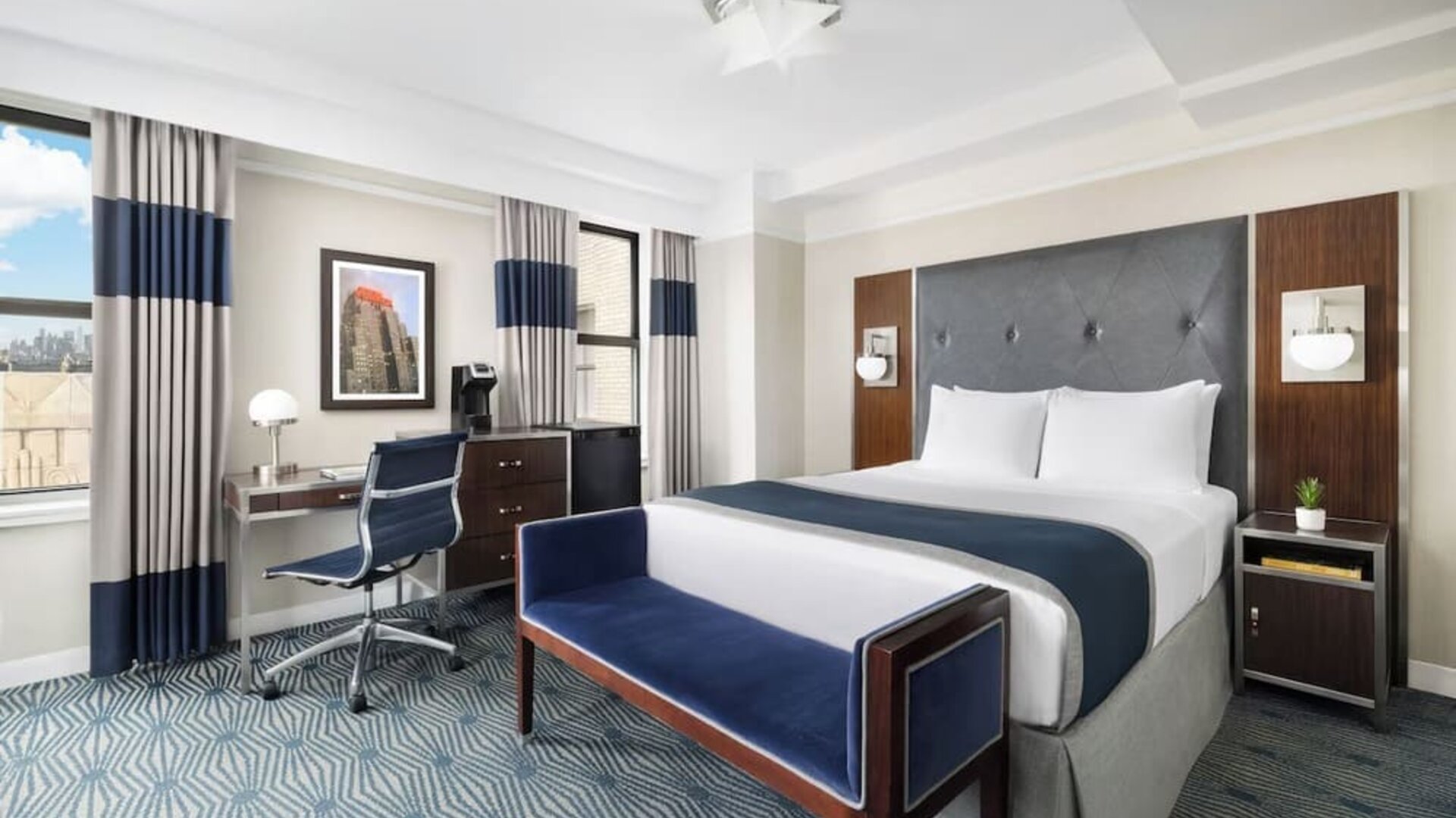 Day use room with work desk and natural light at New Yorker by Lotte Hotels.