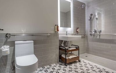Modern bathroom with plush towels at The Draper Tapestry Collection By Hilton.
