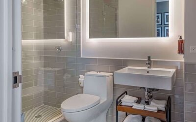 Modern bathroom with plush towels at The Draper Tapestry Collection By Hilton.