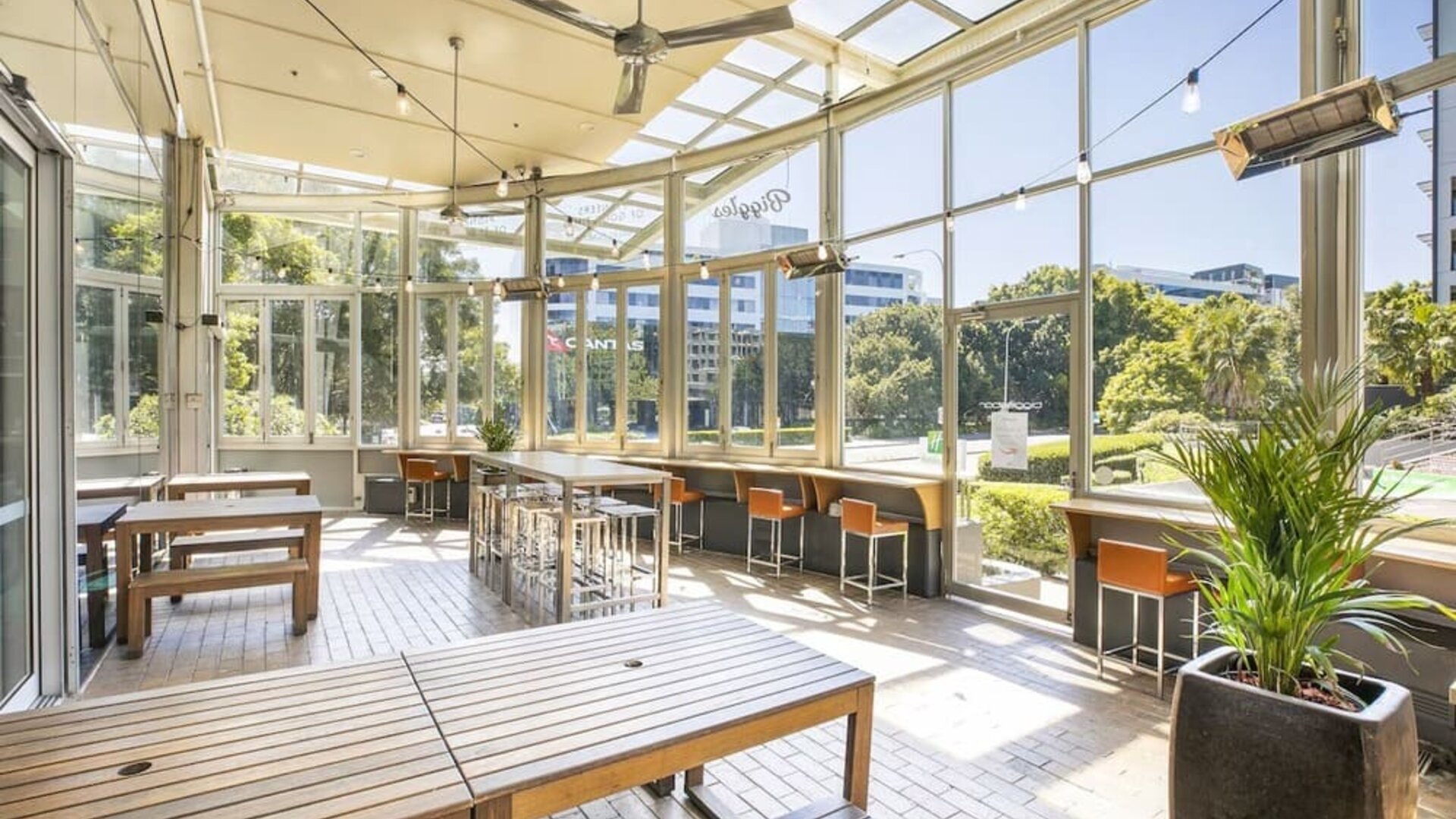 Dining area with natural light perfect for coworking at Crowne Plaza Sydney Airport.