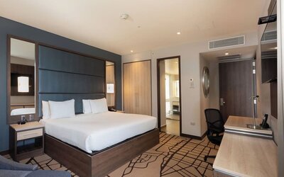 Day use room with work desk at Hilton Garden Inn Bogota Airport.