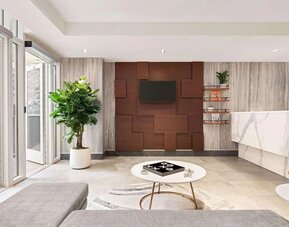 Lobby area with comfortable seating at Wingate By Wyndham New York Midtown South/5th Ave.