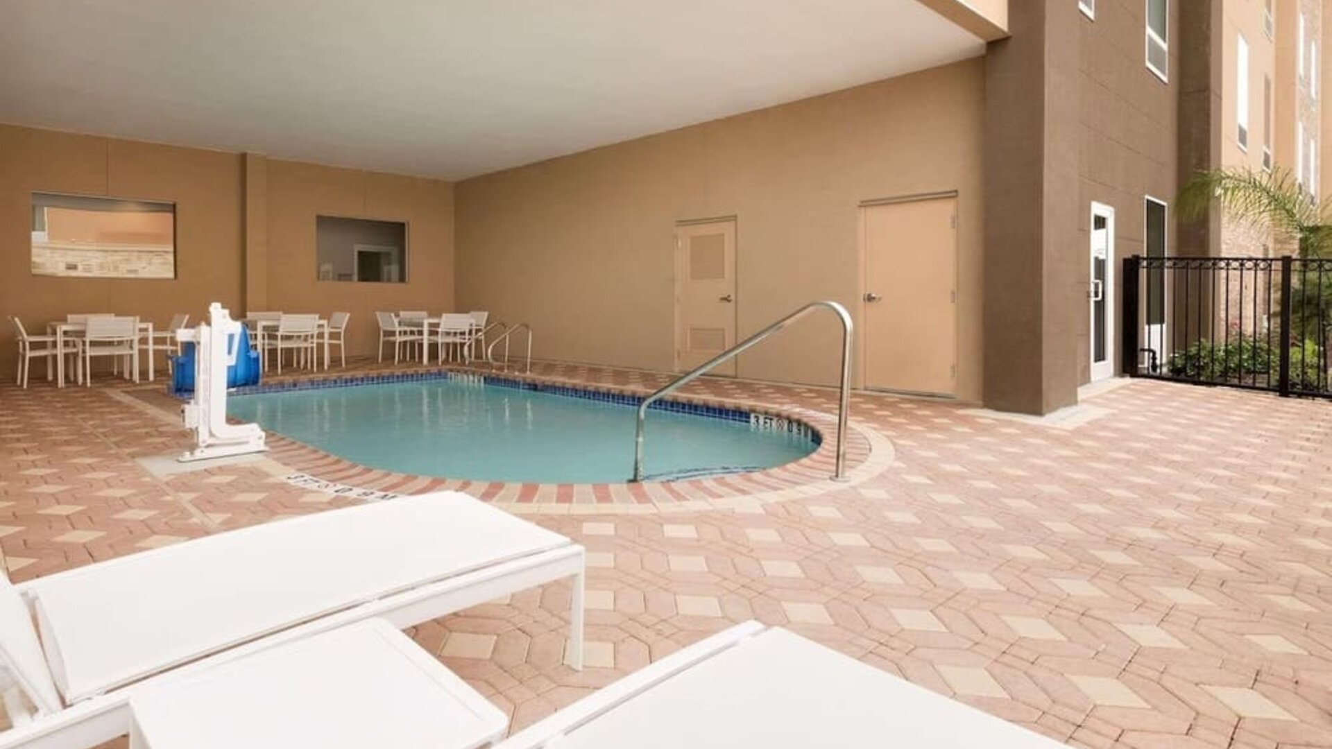 Outdoor pool at Country Inn & Suites By Radisson, Katy - Houston West.