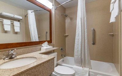 Bathroom with towels  at Comfort Inn Glenmont - Albany South.