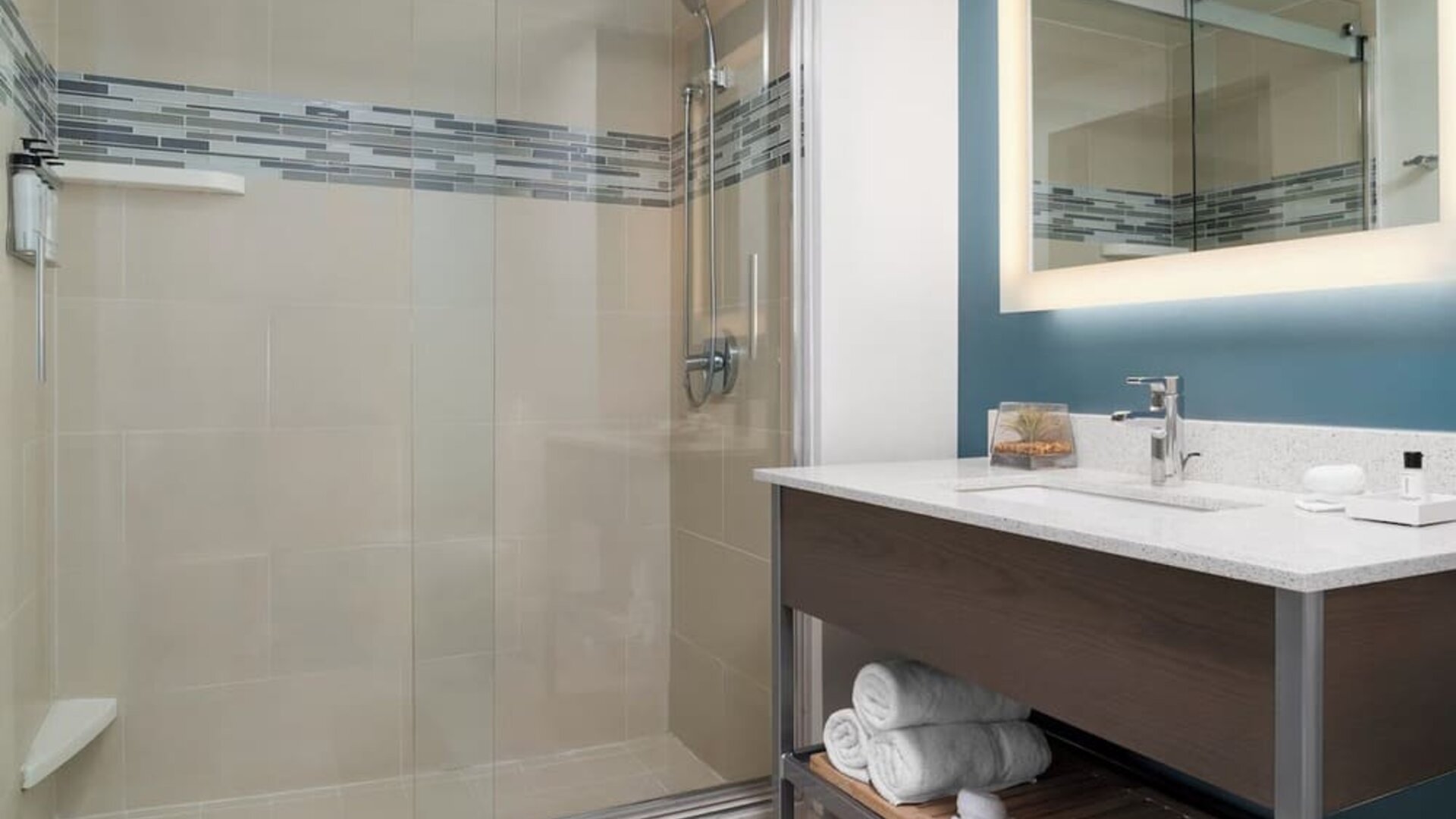 Modern bathroom with plush towels at EVEN Hotel Brooklyn By IHG.