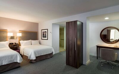 Day use room with work desk and chair at the Hampton Inn Times Square South. 