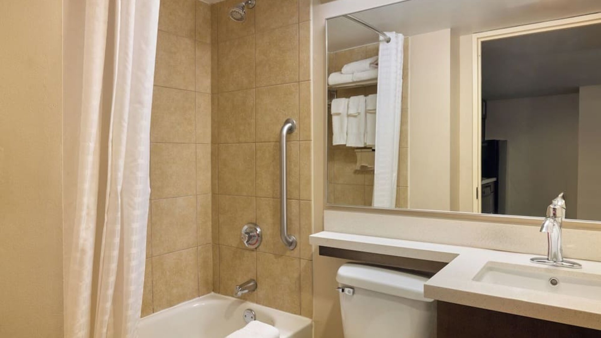 Bathroom with towels at Candlewood Suites Times Square.