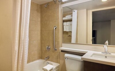 Bathroom with towels at Candlewood Suites Times Square.