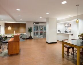 Reception area with comfortable seating at the Holiday Inn Express Times Square.