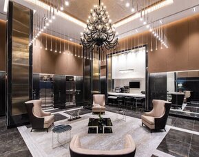 Reception area with comfortable seating at Aliz Hotel Times Square.