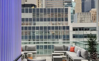 Terrace with ample seats perfect for coworking at The Bernic Hotel New York City, Tapestry Collection By Hilton.